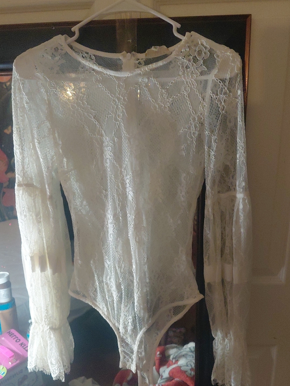 Lace Long-Sleeve Bodysuit in White - Elegant Sheer Design